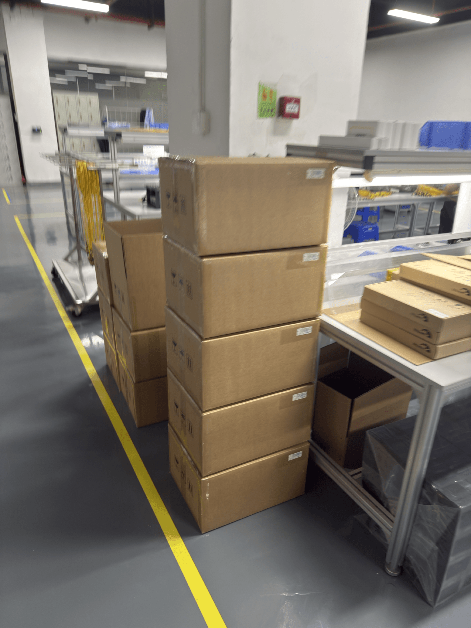 Neutral cartons staged beside the packing bench